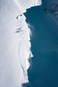 High angle view of man skiing on snow
