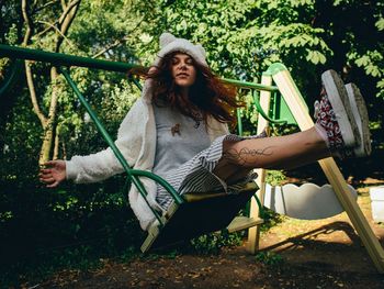 Portrait of young woman outdoors