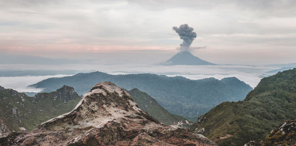 View of active volcano at dusk