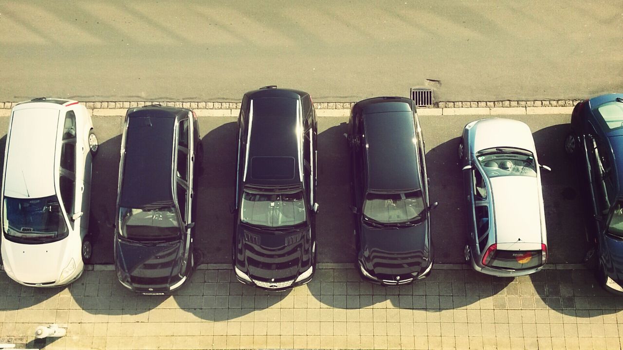 side by side, in a row, arrangement, chair, order, repetition, empty, large group of objects, seat, absence, day, indoors, high angle view, street, shoe, sunlight, flooring, tiled floor, shadow