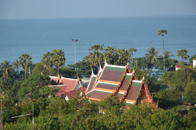 High angle view of swimming pool by sea against sky