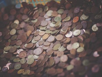 Close-up of coins on table