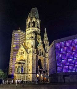 Low angle view of historical building at night