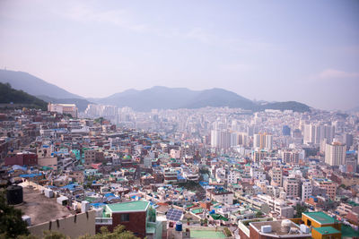 View of cityscape against mountain