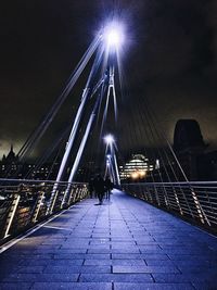 Illuminated street light at night