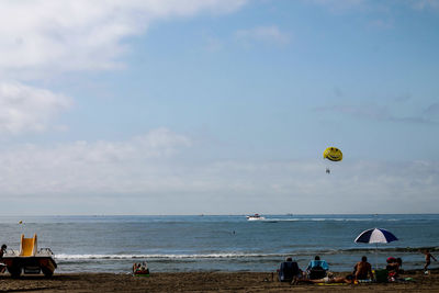People enjoying at beach