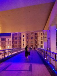 Full length of woman walking in city