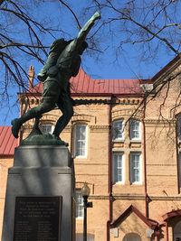 Low angle view of statue against clear sky