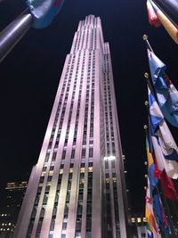 Low angle view of skyscrapers at night