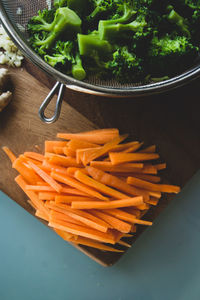 High angle view of chopped vegetables on table