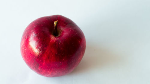 Close-up of apple against white background