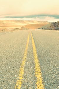 Double yellow line on empty road