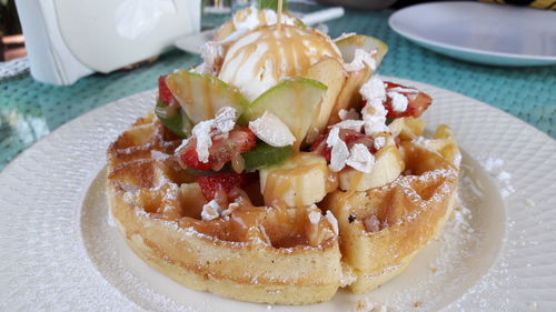 Close-up of dessert served on table