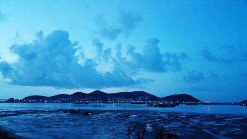 Scenic view of sea against blue sky