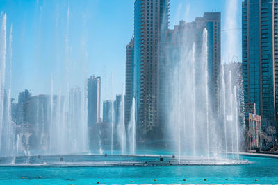 The dancing fountains near burj khalifa skyscraper in dubai.