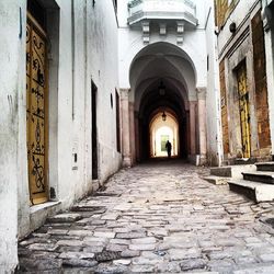 Narrow alley along buildings