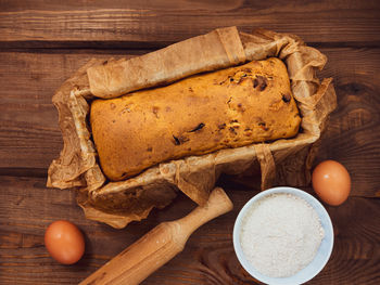 High angle view of bread on cutting board