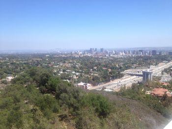 High angle view of cityscape against clear sky