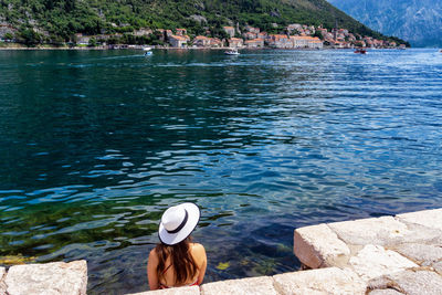 Rear view of man looking at sea