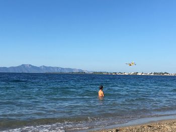 Scenic view of sea against clear sky