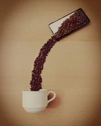 Close-up of coffee cup on table