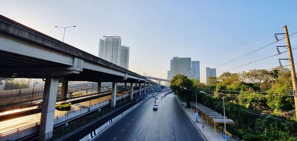 Street amidst buildings against sky