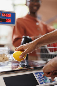 Midsection of man preparing food