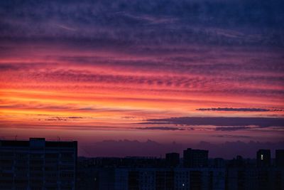Cityscape against sky during sunset