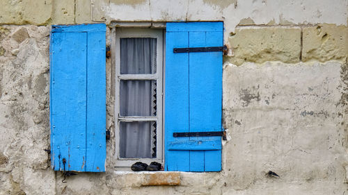 Blue closed door of building