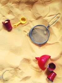Close-up of objects on sand