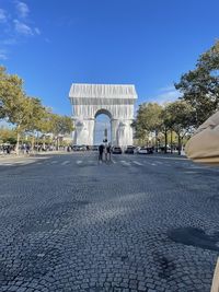 View of historical building against blue sky