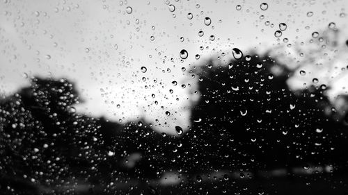 Close-up of wet window in rainy season