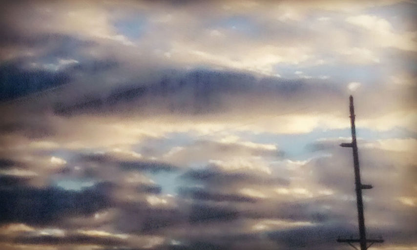 LOW ANGLE VIEW OF ELECTRICITY PYLONS AGAINST SKY