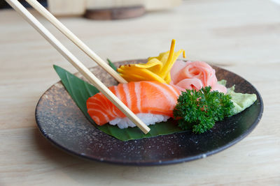 Close-up of fish in plate on table