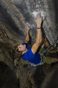 High angle view of man climbing on mountain