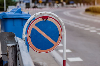 Close-up of road sign on street