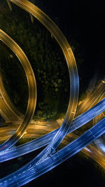 Light trails on street in city at night