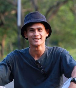 Portrait of young man standing outdoors