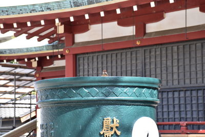 Close-up of lantern on roof