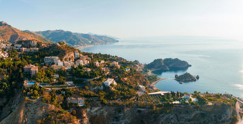 Panoramic aerial view of isola bella island and beach in taormina.