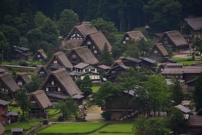 High angle view of houses and buildings in city