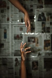 Midsection of woman hand with text