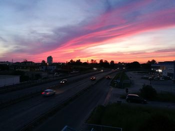 High angle view of traffic on road at sunset