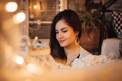 Portrait of young woman smiling