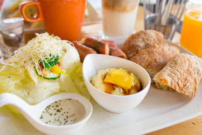 Close-up of breakfast served on table