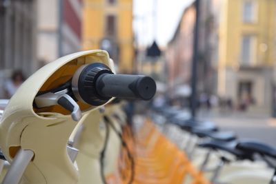 Close-up of bicycle on street in city