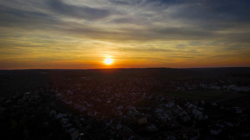Scenic view of landscape against sky during sunset