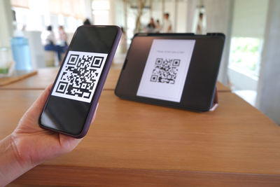 Using technology mobile phone scanning qr code for payment 