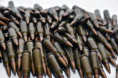 Close-up of bullets on table