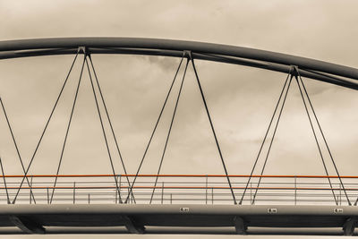 Suspension bridge against sky